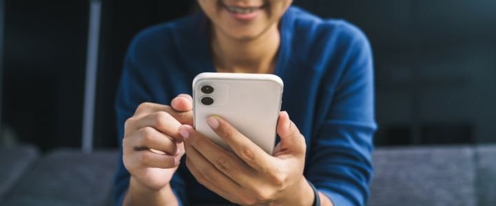 Person Using Mobile Phone