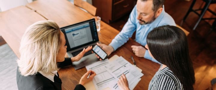 Financial Advisor Discussing Financial Figures