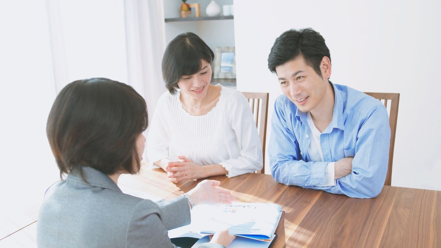 A family reviewing their estate plan with a financial advisor, ensuring secure wealth distribution and legal protection.